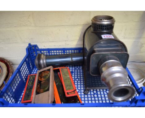 A magic lantern, with various glass slides. 
