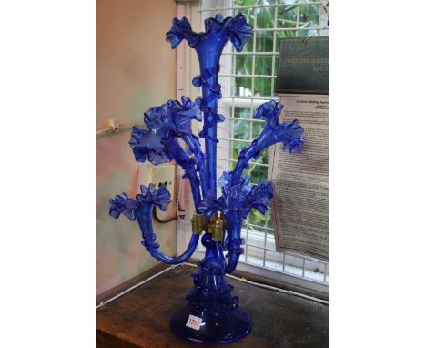 A blue glass seven branch epergne, 60cm high. 