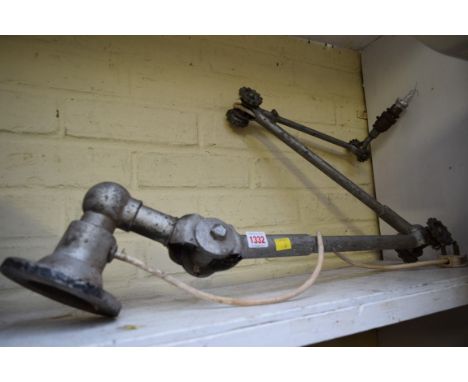 A vintage industrial articulated lamp. 