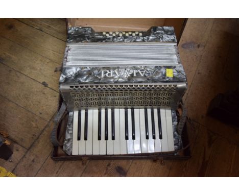 An Alvari piano-accordion, boxed.PLEASE NOTE: The Estrella example is now lot 1458A