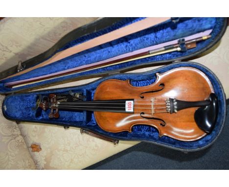 A late 19th century Continental violin, labelled 'Copy of Stainer, Austrian Made', with 14in 'fiddle' back, with bow and case