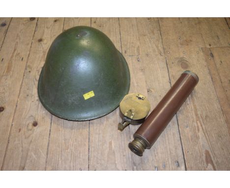 An old green painted tin helmet; together with a Ranger 55 Enbeeco three drawer telescope; and a reproduction compass. 