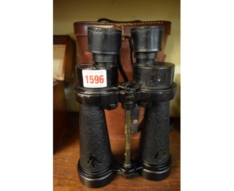 A pair of World War II naval binoculars, 7xCF41, by Barr & Stroud, with broad arrow stamp, in leather case.