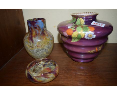 An unusual 1930s Carltonware lilac lustre vase, 15cm high; together with a Monart marbled glass vase, 13cm high, bearing orig