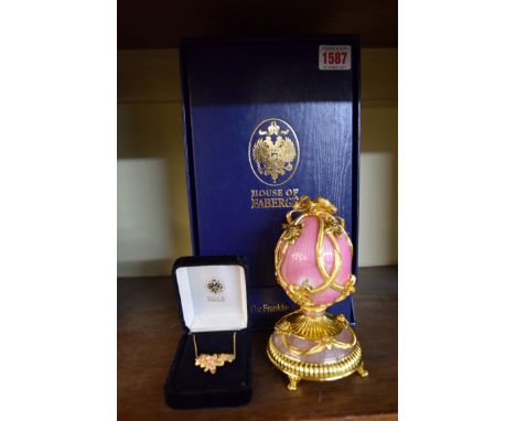 A Franklin Mint House of Faberge 'The Faberge Rose Bouquet' Imperial egg, hallmarked sterling silver and jewel encrusted, box