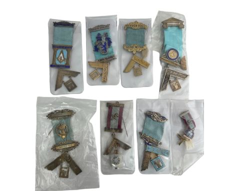 Collection of 8 Past Masters jewels, all marked as silver. Includes: Centre Point Lodge No. 7866, W.M 1979 -80, Clough Hall, 