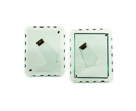 A pair of glass portrait frames, attributed to Fontana Arte, '50s 30by23,5cm. each (one frame chipped)