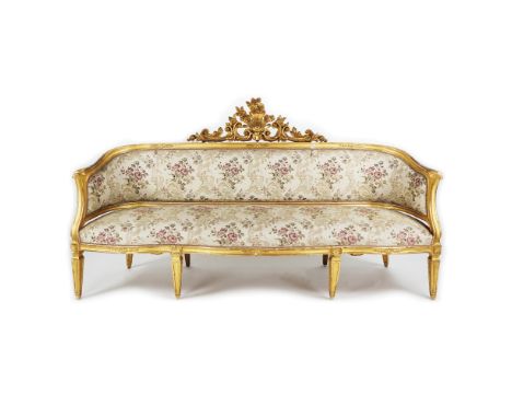 A carved gilt wood sofa and a pair of armchairs, 19th century the sofa 123x226x55cm. (some defects)