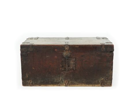 An antique travel trunk with iron reinforcements 47x97x46cm.