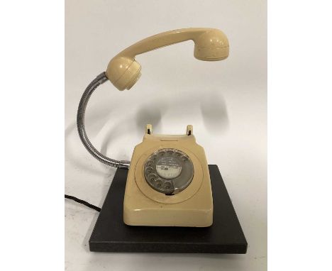 Retro Cream 1970s Rotary Dial Telephone, on 25cm x 23cm baseDue to the nature and fragility of the lots in this auction, we a