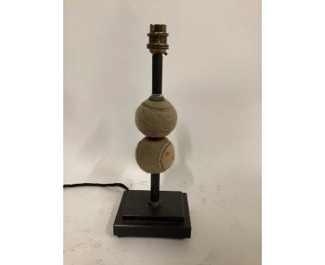 Tennis ball lamp, 33cm on 10cm x 12.5cm square baseDue to the nature and fragility of the lots in this auction, we are unable