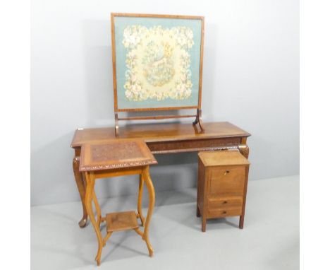 A continental style mahogany and parquetry topped side table, with carved decoration and raised on cabriole legs, 135x69x43cm