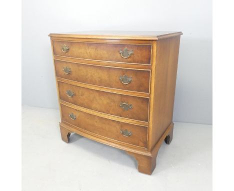 A 19th century walnut bow-front chest of four long drawers, raised on bracket feet. 79x85x51cm. 