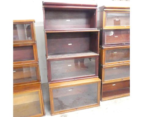 A Globe Wernicke mahogany sectional stacking bookcase, with four shelves and maker's labels. Overall 87x174x46cm.Age related 