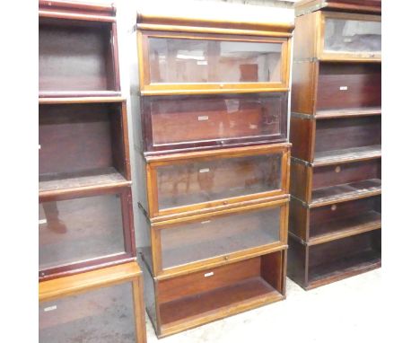 A Globe Wernicke mahogany sectional stacking bookcase, with five shelves and maker's labels. Overall 87x170x29cm.Age related 