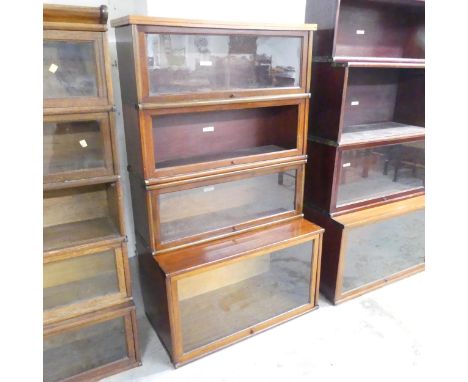 A Globe Wernicke mahogany sectional stacking bookcase, with four shelves and maker's labels. Overall 87x150x46cm.Age related 
