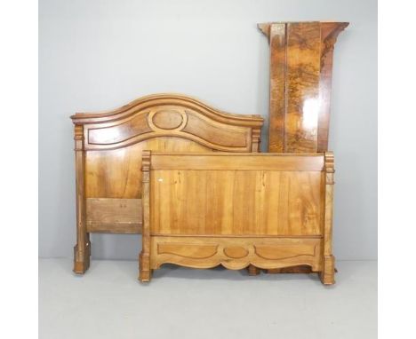 A French walnut 4' double bed, with size rails and slats. Headboard dimensions 136x134x13cm.Slats are assembled as a baseboar