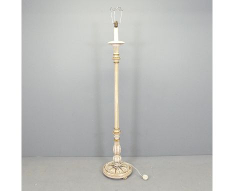 A painted continental style standard lamp, with carved and fluted decoration.Untested. 
