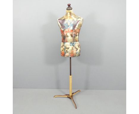 CLIVE FREDRIKSSON - A decoupage decorated mannequin of male form. Height 170cm. 