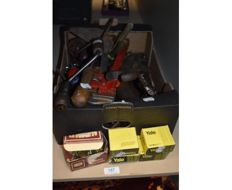 A selection of 20th century hardware and building tools including door locks and scotch brace