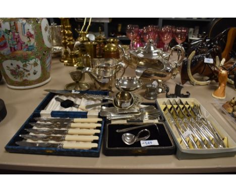 A selection of plated ware and  vintage flat ware including strainer, forks, plated tea pot, sugar basin, babies spoon and pu