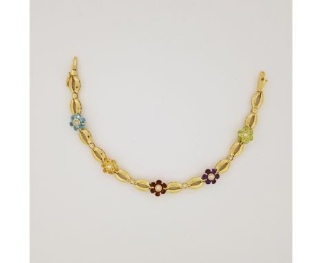 14K Gold Multi-Stone &amp; Diamond Bracelet. This bracelet is set with (5) flower shaped segments set with semi-precious ston