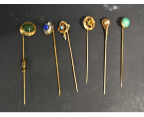 A Collection of Six Various Stick Pins