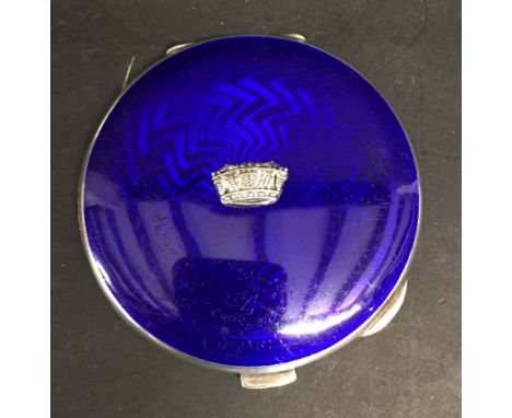 A Silver and Blue Enamel Compact, the blue enamel with applied silver crown