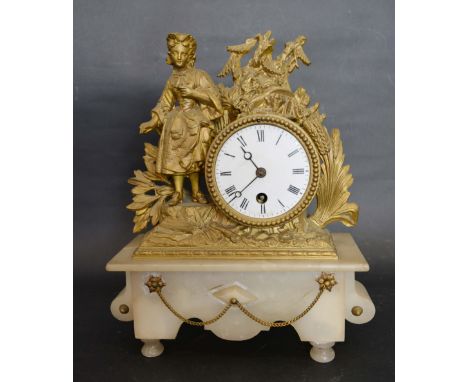 A 19th Century French Gilded Spelter Mantle Clock with figural surmounts, the enamel dial with single train movement, 30 cms 