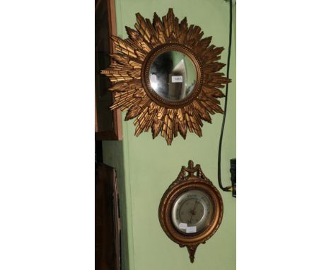 A gilt framed convex sunburst wall mirror by Gomme Furniture, Wycombe, and a gilt barometer stamped 'S B'
