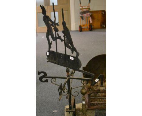 A black painted iron copy of the weather vane at Twickenham 