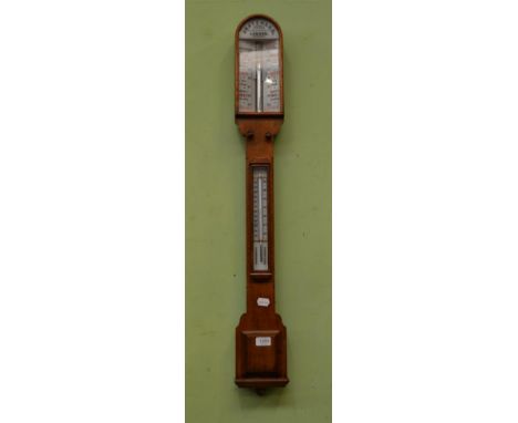 A Victorian oak stick barometer, the twin double vernier dial, signed JH Steward, Optician, 66 Strand London, with a conceale