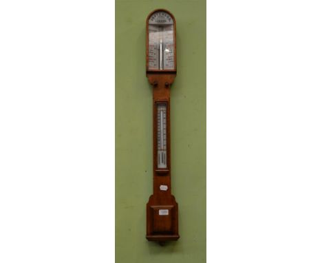 A Victorian oak stick barometer, the twin double vernier dial, signed JH Steward, Optician, 66 Strand London, with a conceale