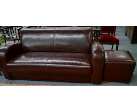 A modern leather sofa and stool 