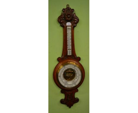 Late Victorian carved oak barometer