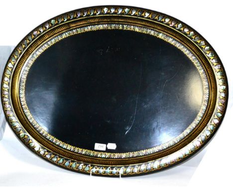 A Victorian papier mache oval tray with mother of pearl border
