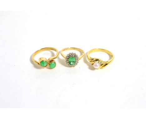 A 9 carat gold green paste and diamond cluster ring, total estimated diamond weight 0.15 carat approximately, finger size J1/