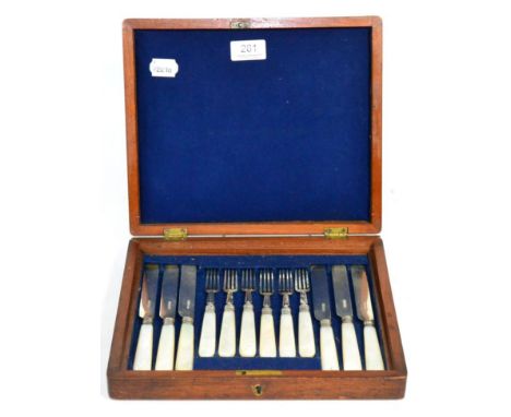 A silver bladed and mother of pearl handled set of fruit knives and forks in an oak case