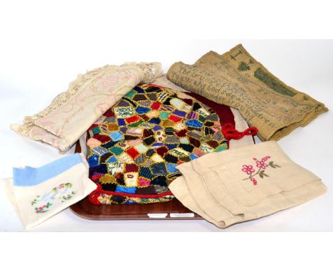 A 19th century needlework sampler dated 1834, two needlework cushion covers etc