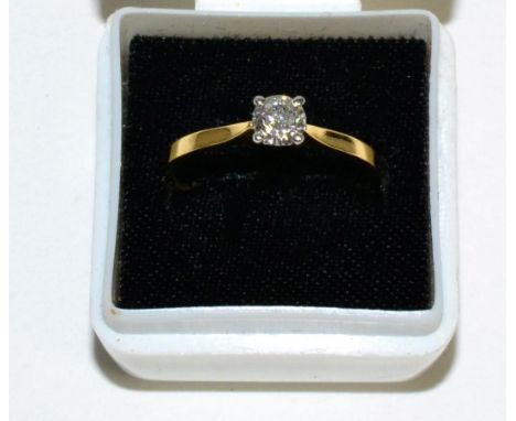 An 18 carat gold solitaire diamond ring, a round brilliant cut diamond in a claw setting, to knife edge shoulders, estimated 