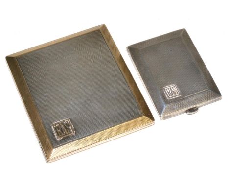 A silver slide action cigarette case with silver gilt border and interior, monogrammed RAS together with a silver vesta with 