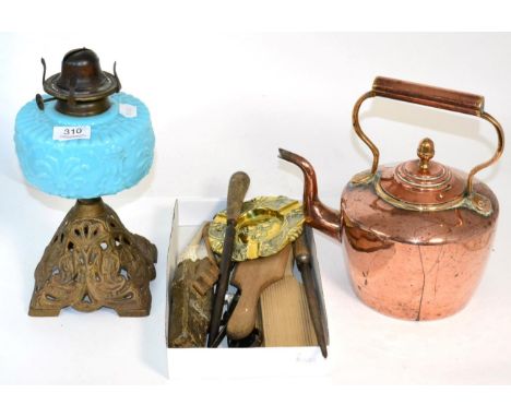 A Victorian oil lamp, a copper kettle, various butter pats, pastry cutters etc