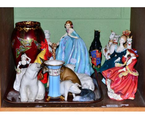 A Royal Worcester lady 'The Dutchess's Dress' modelled by F. G. Doughty, two Royal Doulton lady's, a Coalport lady, Devon Fie