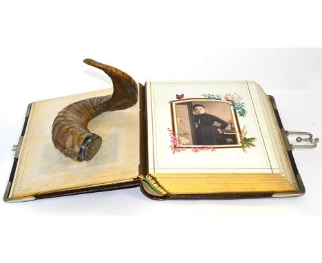 A silver mounted presentation horn snuff mull and a Victorian leather bound photograph album containing numerous portrait pho