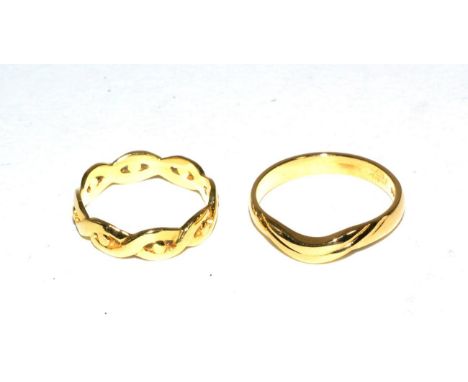 An 18 carat gold scroll band ring, finger size P and an 18 carat gold  twisted band ring, finger size L (2)Gross weight 6.52 