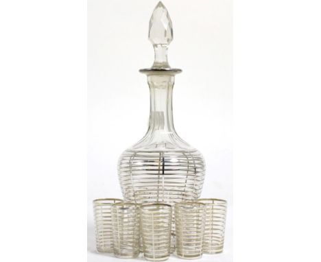 An early 20th century white metal clad liqueur decanter with five glasses (6)