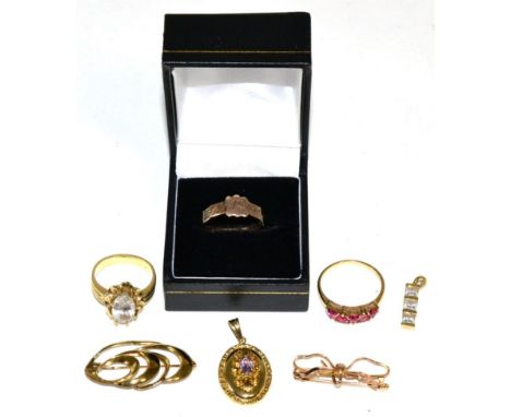 A 9 carat gold mouring ring, with a central shield shaped cartouche and the shank with plaques engraved to read 'REGARD', wit