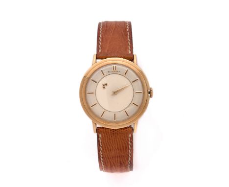 LONGINESANNEES 60Montre bracelet en or jaune 14 K sur cuir.BOITIER : rond à degrés. Signé à l'intérieur Longines-Wittnauer, N