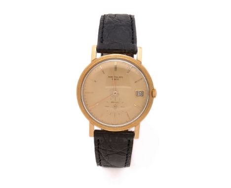 PATEK PHILIPPE DOUBLE SIGNATURE "ARTE SUIZO"CALATRAVA. REF. 3445/6.ANNEES 60Montre bracelet en or jaune sur cuir.BOITIER : ro