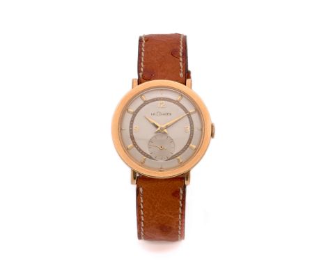 LE COULTREMontre bracelet en or rose 14K sur cuir.BOITIER : rond.CADRAN : argenté avec index appliqués, aiguilles dauphine et
